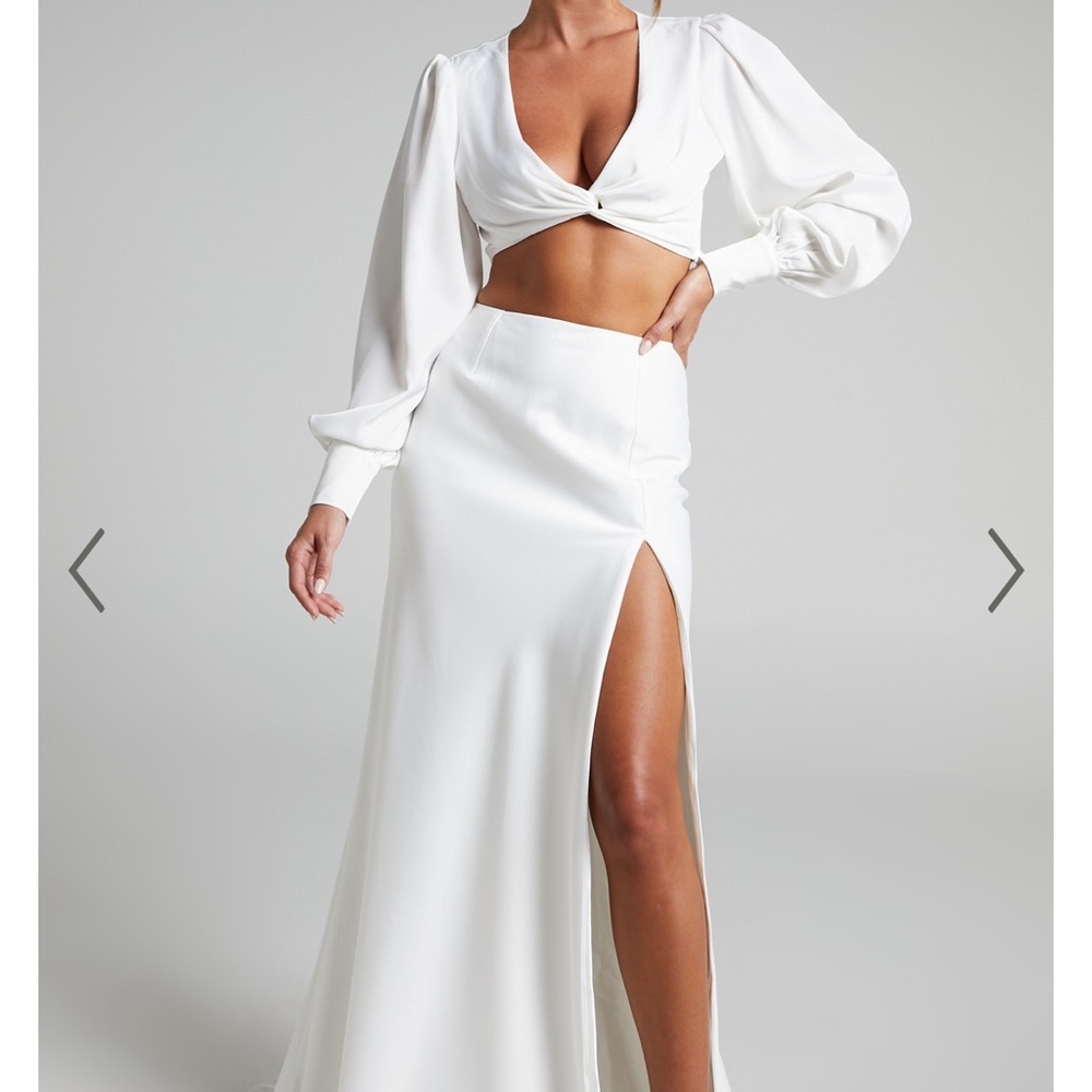 Two piece, ivory, skirt set. Gorgeous for a bride and bridal events.